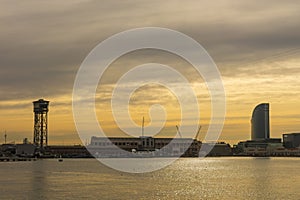 Sunrise at the port of Barcelona, at the end of the Ramblas. Bar