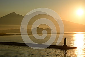 Sunrise on the port and Mount Vesuvius. Napoli. Campania. Italy