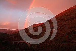 Sunrise with rainbow