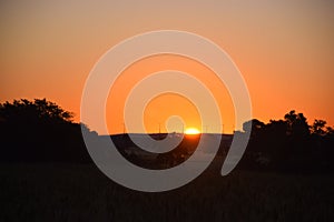 Sunrise, the redness of the sun, the wheat fields, the beautiful view of the sunrise