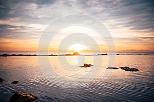 Sunrise reflection on the water