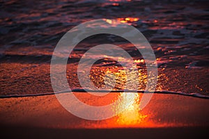 Sunrise reflection on waves