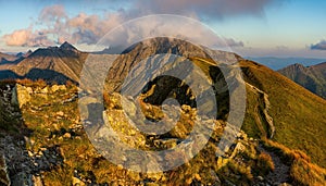 Sunrise from the ridge of the Western Tatras, Rohace with a view of the Salatin mountain with grass