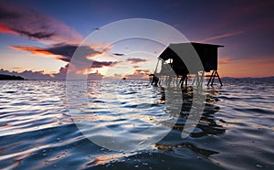 Sunrise with rippling water surface at Sabah, Malaysia