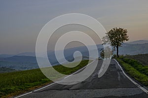 Sunrise on the road in the mountains. natural background. Appennino tosco-emiliano photo