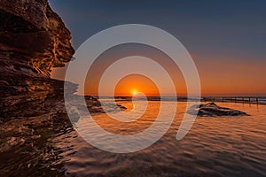 Sunrise on the Rock pool at North Curl Curl Beach, Sydney, Australia