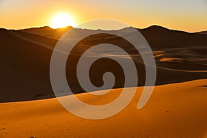 Sunrise in Sahara desert Morocco photo