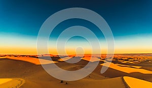 Sunrise in the Sahara desert next to M`hamid in Morocco