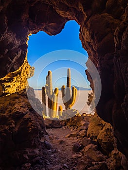 Sunrise on the salt flat of Uyuni inside a cave photo