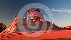 Sunrise at sandstone formation in the Sahara desert near Yoa Lake group of Ounianga Kebir, Ennedi, Chad