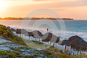 Sunrise on the sandy beach of island of Cayo Largo, Cuba. Copy space for text. photo