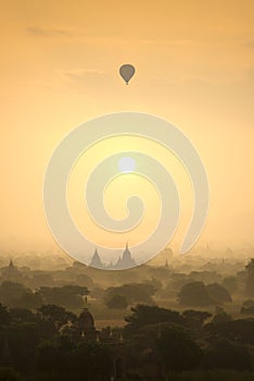 Sunrise scene hot air balloons fly over pagoda ancient city field in Bagan Myanmar.High image quality