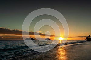 Sunrise scene at Lanikai Beach in Kailua, Hawaii on island of Oahu