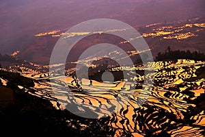 The Sunrise scenery of Yuenyang Hani Terrace in Yunnan , China