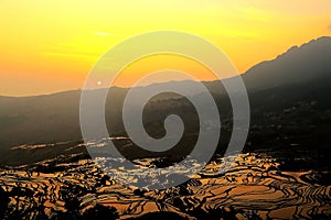 The Sunrise scenery of Yuenyang Hani Terrace in Yunnan , China