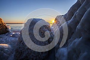 Sunrise by the sea in winter