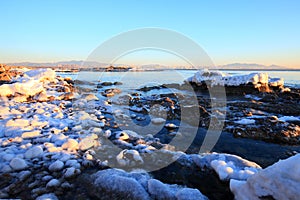 Sunrise by the sea in winter