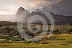 Sunrise at Seiser Alm with meadows and mountain range in the European Dolomite Alps, South Tyrol Italy