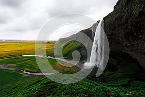 Sunrise on Seljalandfoss waterfall