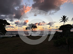 Sunrise in September at Hikinaakala Heiau in Wailua Bay on Kauai Island, Hawaii.