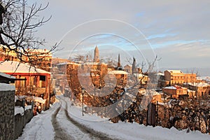 The sunrise in Sighnaghi town in winter photo
