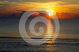 Sunrise and silhouette on beach at beach Ban Krut