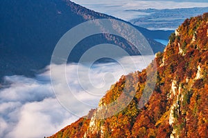 Sunrise from Sip mountain during autumn with inversion mist in the valley