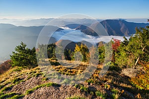 Sunrise from Sip mountain during autumn with inversion mist in the valley