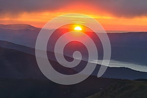 Sunrise from Skalka mountain with clouds during autumn in Low Tatras mountains