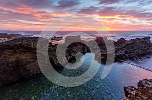 Sunrise skies over Nuns Baths