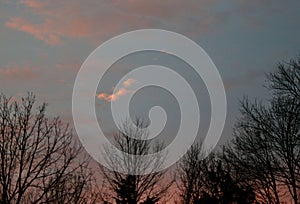 Sunrise sky blue as a pink cloud shaped like a baby floats along Jenningsville Pennsylvania