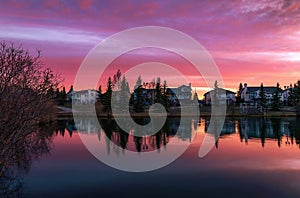 Sunrise Sky Reflecting In A Spring Park Lake