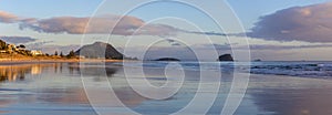 Sunrise sky reflection, Mount Maunganui beach panorama, Tauranga, New Zealand