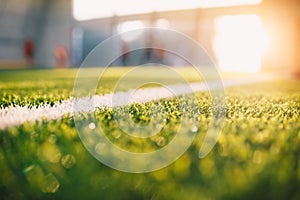 Sunrise at Soccer Football Pitch. Close-up Image of Football Field White Sideline photo