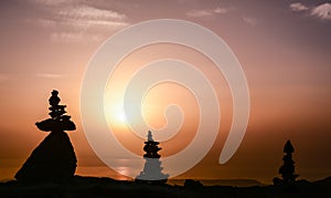 Sunrise at the summit with zen stones