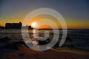 Sunrise or sunrise overlooking the sea and a line of hotels in Cancun