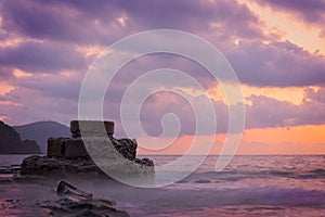 Sunrise, sunset on a breakwater in the Islote del Moro, Almeria, Andalusia, Spain