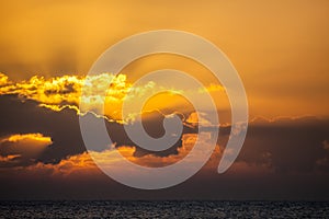 Sunrise or sunset at sea. Ocean sky background image.