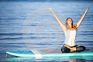 Sunrise SUP Yoga practice in Waikiki meditation