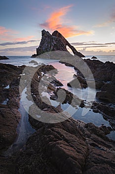 Sunrise time by the Bow Fiddle Rock in Scotland
