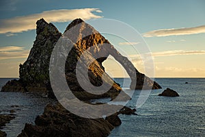 Sunrise time by the Bow Fiddle Rock in Scotland