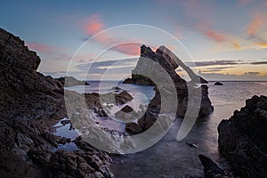 Sunrise time by the Bow Fiddle Rock in Scotland