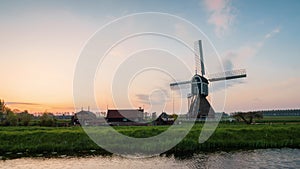 Sunrise timelapse of an ancient Windmills in Kinderdijk in Netherlands