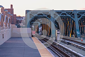 Sunrise on the train platform as the G Train arrives at the Smith Street