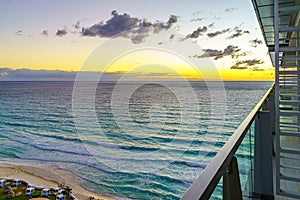 Sunrise on the tropical beach of Cancun, beautiful sea in Mexico. Beautiful shining clouds. Place for text