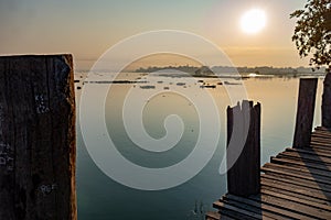 Sunrise on U Bein bridge near Mandalay in Myanmar