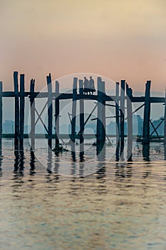 Sunrise on U Bein bridge near Mandalay in Myanmar