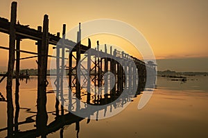 Sunrise on U Bein bridge near Mandalay in Myanmar