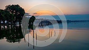 Sunrise on U Bein bridge near Mandalay in Myanmar