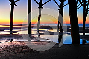 Sunrise Under Folly Beach Pier photo